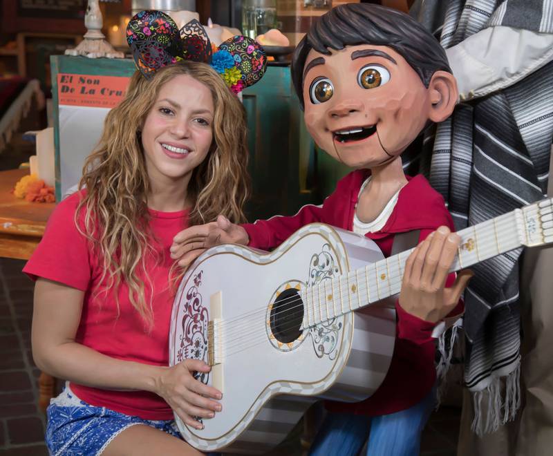 ANAHEIM, CA.  SEPTEMBER 09:  In this handout photo provided by Disney Parks, Global superstar Shakira meets Miguel of Disney-Pixars Coco while on break from her world tour at Disney California Adventure September 9, 2018 in Anaheim, California.  Miguel serenades Disney California Adventure guests daily at Plaza de la Familia during  Musical Celebration of Coco.  (Photo by Joshua Sudock/Disney Parks via Getty Images)