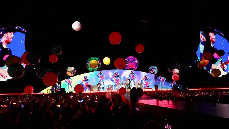 Coldplay performs at the Rose Bowl Stadium.