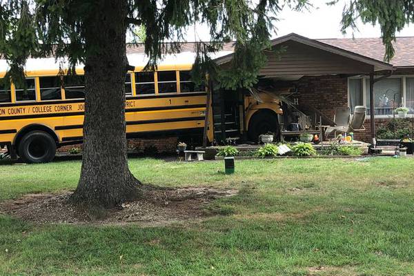 School bus crashes into a house in Ohio; no students injured, driver taken to the hospital