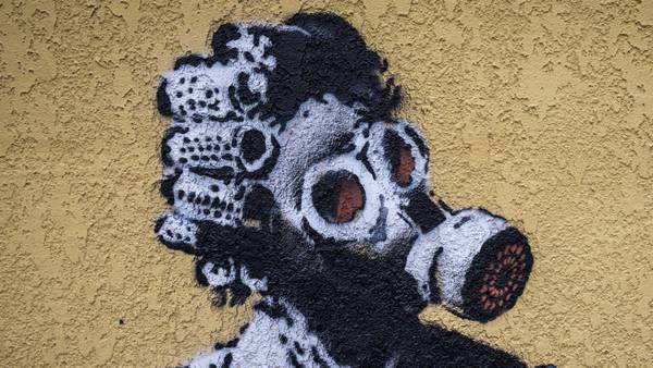 Photos: Graffiti, likely by Banksy, appears all over war-torn city in Ukraine
