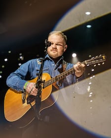 Check out the photos from Zach Bryan's concert at the BOK Center on December 12th, 2024.