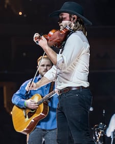 Check out the photos from Zach Bryan's concert at the BOK Center on December 12th, 2024.