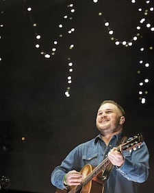 Check out the photos from Zach Bryan's concert at the BOK Center on December 12th, 2024.