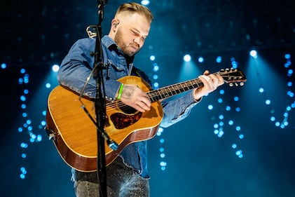 Check out the photos from Zach Bryan's concert at the BOK Center on December 12th, 2024.