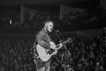 Check out the photos from Zach Bryan's concert at the BOK Center on December 12th, 2024.