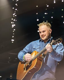 Check out the photos from Zach Bryan's concert at the BOK Center on December 12th, 2024.