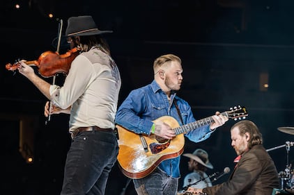 Check out the photos from Zach Bryan's concert at the BOK Center on December 12th, 2024.